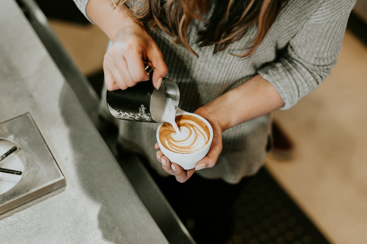 Latte art being poured